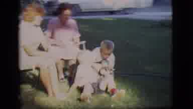 Des Moines Iowa (1966): Two Women Sitting In Chairs With Children Playing With Dog