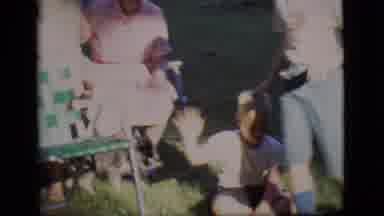 Des Moines Iowa (1966): People And A Dog Walking Around And Sitting In Lawn Chairs