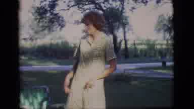 Des Moines Iowa (1966): People Sitting On Chairs And On The Grass In The Yard