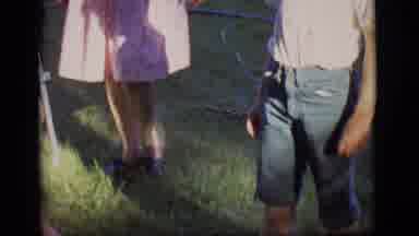 Des Moines Iowa (1966): People Standing In The Grass As A Schnauzer Walks