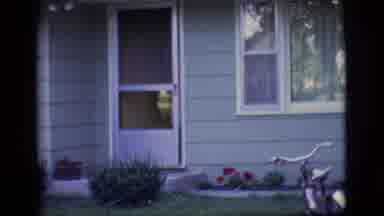 Des Moines Iowa (1966): A Woman Walks In And A Boy Walks Out Of A Door To A Home