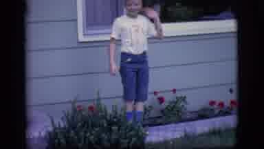 Des Moines Iowa (1966): Boy Waves Then Goes For A Ride On His Bike