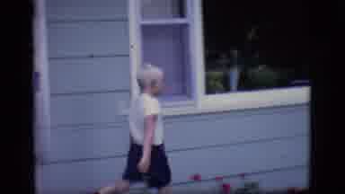 Des Moines Iowa (1966): A Young Boy Walking Into His Home