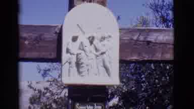 San Luis Colorado (1965): Monkey Eating While Another Monkey Circles Around