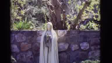 SAN LUIS COLORADO-1965: The Statue Of The Virgin Mary Sine Nicely In The Wind
