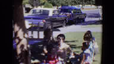 Evansville Indiana USA (1967): Children Gathered With A Woman In An Outdoor Area