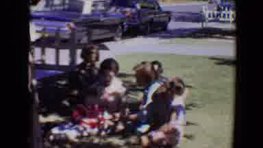 Evansville Indiana USA (1967): Family All Sit Out On The Lawn Beside A Removal