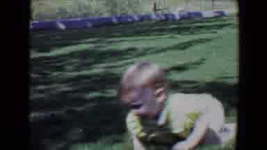 Evansville Indiana USA (1967): Video Of A Baby Crawling On The Grass In A Green