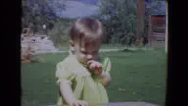 Evansville Indiana USA (1967): Little Girl In A Green Dress Crawls Around The