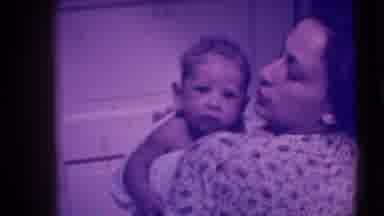 Trenton New Jersey (1941): Mom Burping Her Kid Over Her Shoulder