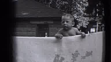 Trenton New Jersey (1941): Baby Boy Standing And Looking With Plain Expression