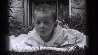 Trenton New Jersey (1941): Black & White Baby On A Blanket On The Ground By