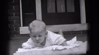 Trenton New Jersey (1941): A Baby All In White On The Outside Of The House On A