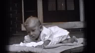 Trenton New Jersey (1941): Baby Laying On Ground Holding Up Head Pulling Up Into