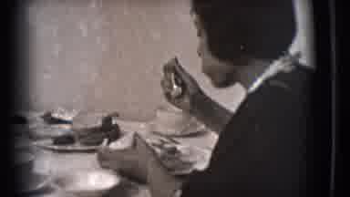 Trenton New Jersey (1941): Woman Eats Breakfast While Toddler Pokes At Pet At End