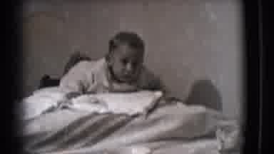 Trenton New Jersey (1941): Baby Laying On Stomach Holding Up Head Smiling For