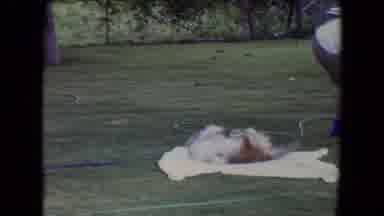 Flagstaff Arizona (1961): Dog Rolls On Towel