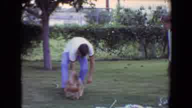 Flagstaff Arizona (1961): Boy Playing Fetch With His Dog In A Park With Friends