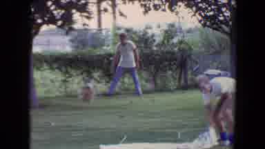 Flagstaff Arizona (1961): Man And Dog Playing Fetch In Yard And Teen Picking Up