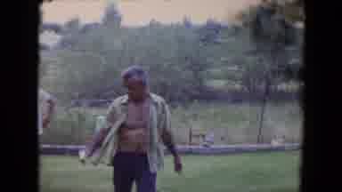 Flagstaff Arizona (1961): Older Man With Unbuttoned Shirt Walks Up To The Camera
