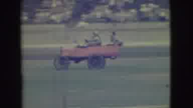 Denver Colorado (1949): Three Men Ride In Antique Car Through Field Or Track With