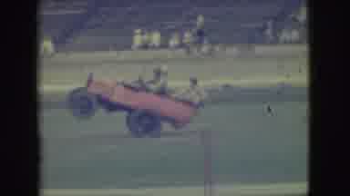 Denver Colorado (1949): Three Men In An Old Pink Car Getting Bounced Out With