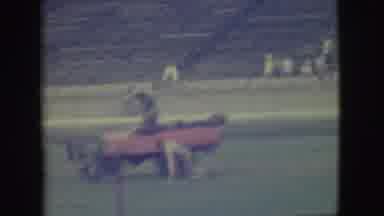 Denver Colorado (1949): Two People Playing On A Baseball Field And One On A Cart
