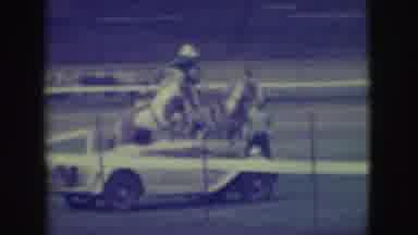 Denver Colorado (1949): Man Standing On The Backs Of Two Trained Horses As They