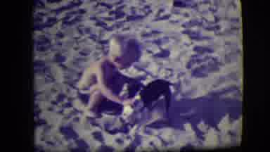 Asbury Park New Jersey (1946): Little Boy At The Beach Tries To Restrain His Pup