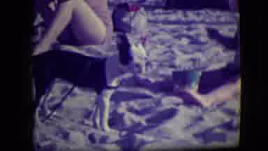 Asbury Park New Jersey (1946): A Child Plays In The Sand As His Dog Stands On The