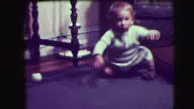 Union City New Jersey (1942): A Small Child Walking Around On The Floor Learning