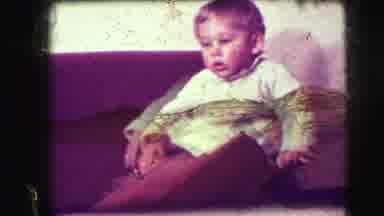 Union City New Jersey (1942): Child Sitting On The Couch And On The Chair Trying