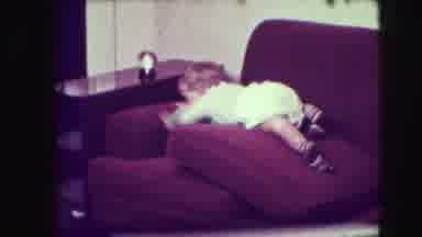 Union City New Jersey (1942): Baby On The Sofa Trying To Reach Out For The
