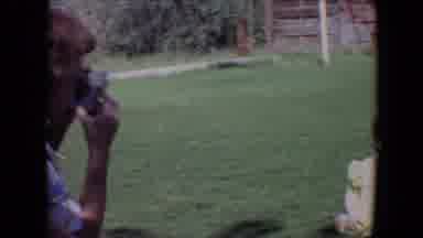 Davis California (1967): Woman Takes Photos Of The Baby Sitting In The Grass Then