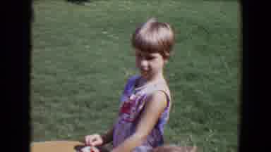 Davis California (1967): Two Kids Playing Outside With Round Ottoman On The Grass