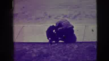 Elmwood Park Illinois (1945): Mother Helping Child Put On Skates On Sidewalk