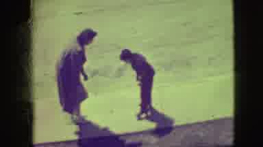 Elmwood Park Illinois (1945): Boy On Roller Skates Tries To Go Down The Sidewalk