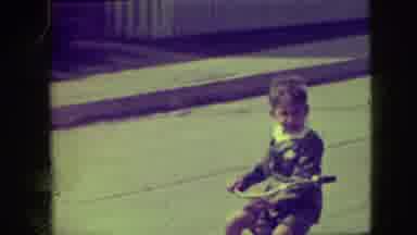 Elmwood Park Illinois (1945): Young Well Dressed Boy Riding His Tricycle Down The