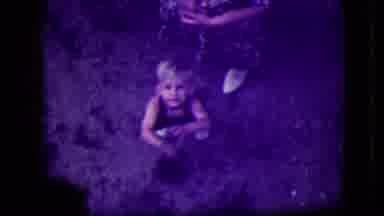 South Haven Michigan (1946): Little Blond Haired Boy Shows Off An Animal He Caught