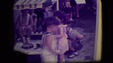 South Haven Michigan (1946): Young Children Play In A Sandbox One Child Offers A
