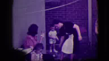 South Haven Michigan (1946): Adults Playing With Children In Yard