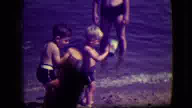 South Haven Michigan (1946): Little Boy Takes Bucket Of Water From The Ocean Then