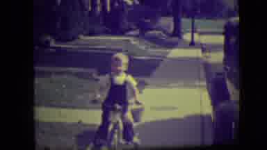 Park Ridge Illinois (1946): Young Blond Haired Boy Eating Candy And Saluting The