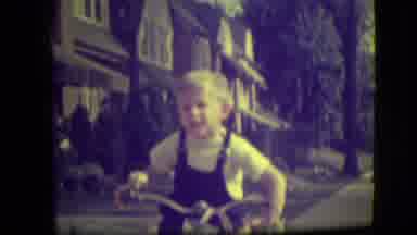 Park Ridge Illinois (1946): Boy Rides A Bicycle In Front Of His Residence On A