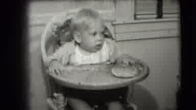Levittown New York (1942): Toddler Tests And Studies Pancake Before Celebrating