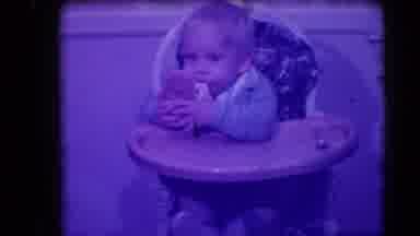 Levittown New York (1942): Toddler Samples Large Roll And Expresses Satisfaction