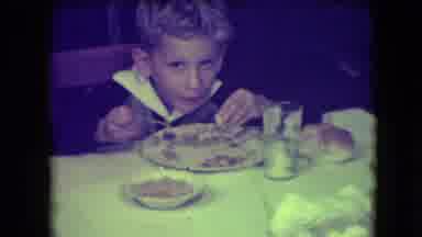 Patterson New Jersey (1946): Smiling Male Child Eating And Drinking Milk At A