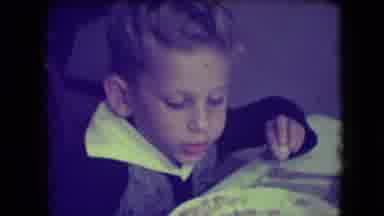 Patterson New Jersey (1946): A Young Boy Sits At The Table And Eats From A White