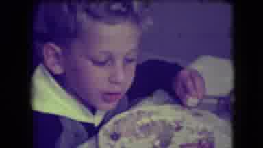 Patterson New Jersey (1946): Blonde Boy Enjoys Family Dinner
