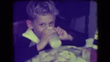 Patterson New Jersey (1946): A Little Boy Drinking Milk In A Glass While Eating